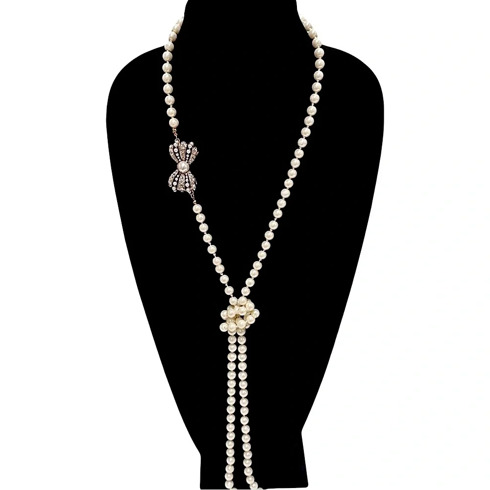 Miss Mandy's Double-Strand Ivory Pearl Necklace with Jeweled Bow Accent